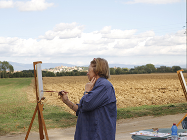 Artist painting in Tuscany during Walk the Arts art workshops in Italy