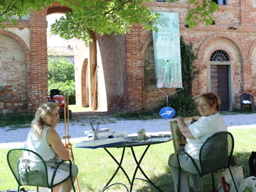 Two artists painting during our art retreat in Tuscany Italy offered every June and October
