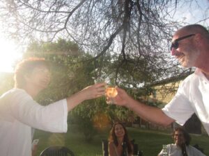 Husband toasting with student